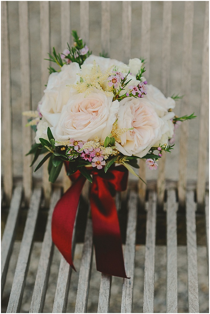 Rustic wedding in Tuscany - Featured on My Lovely Wedding Blog.  - Beautiful bridesmaids bouquet tied with a red ribbon. 